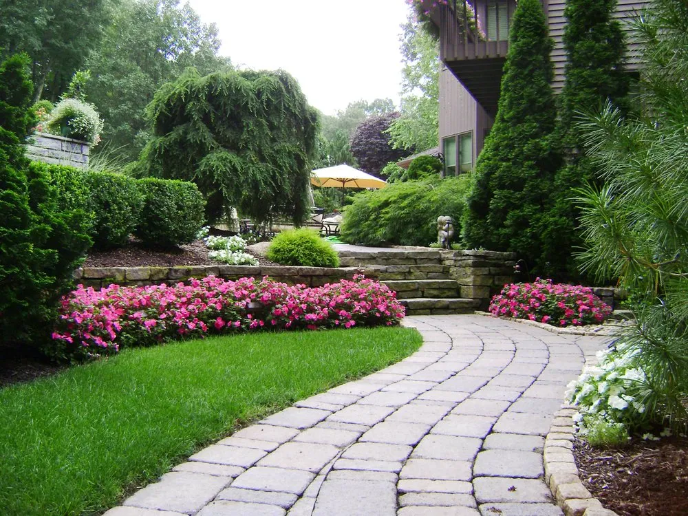 Professional residential landscaping for year-round maintenance in Vernon, CT by Creative Exteriors