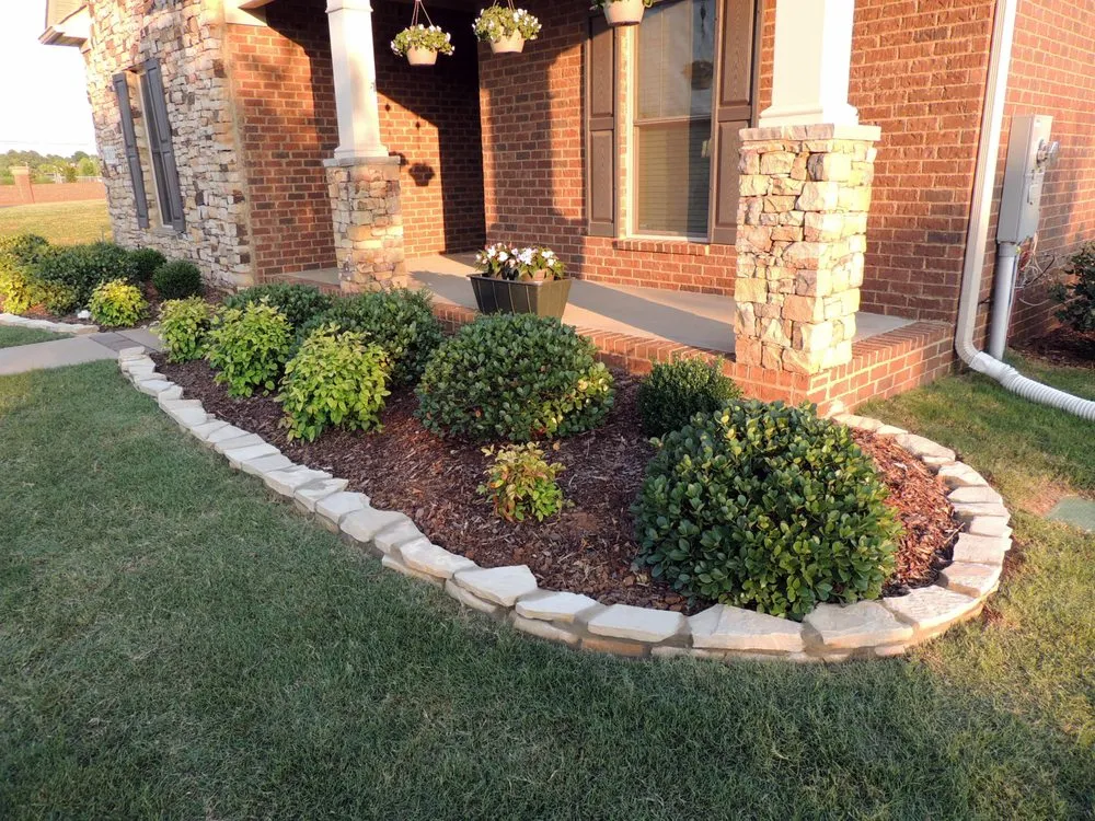 Custom landscaping services for year-round maintenance in Brownsboro, AL by Creative Gardening