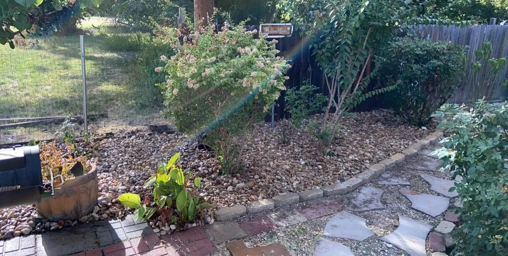 Custom landscape installation with custom design in New Braunfels, TX by Creative Landscape and Fencing