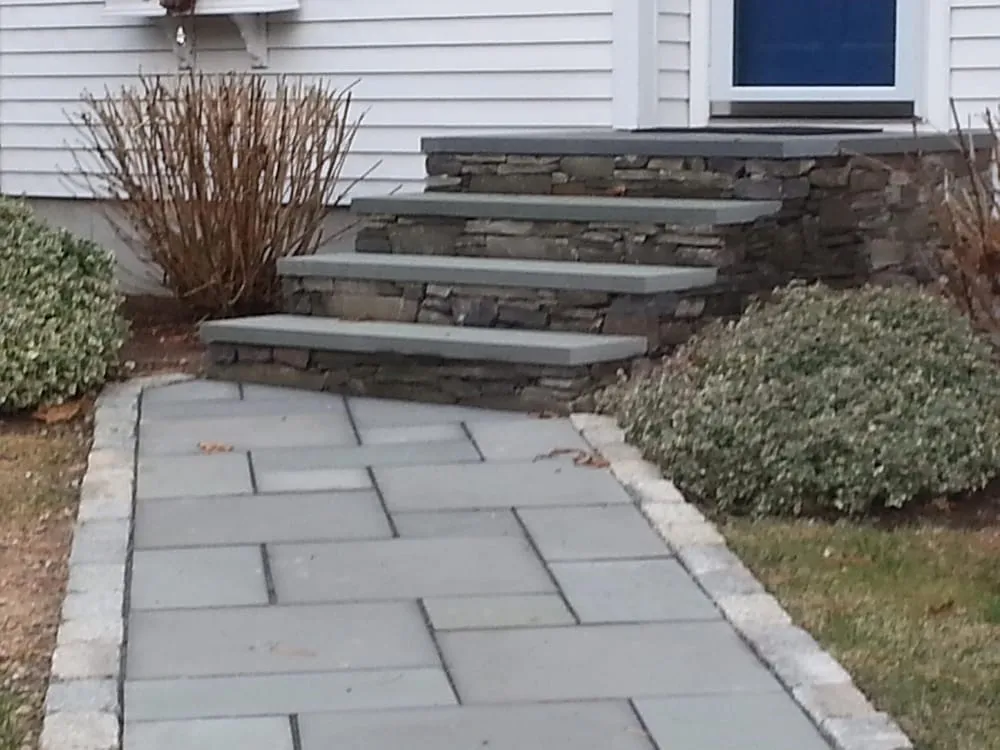 Expert lawn care service experts serving East Falmouth, MA - Creative Masonry and Landscape