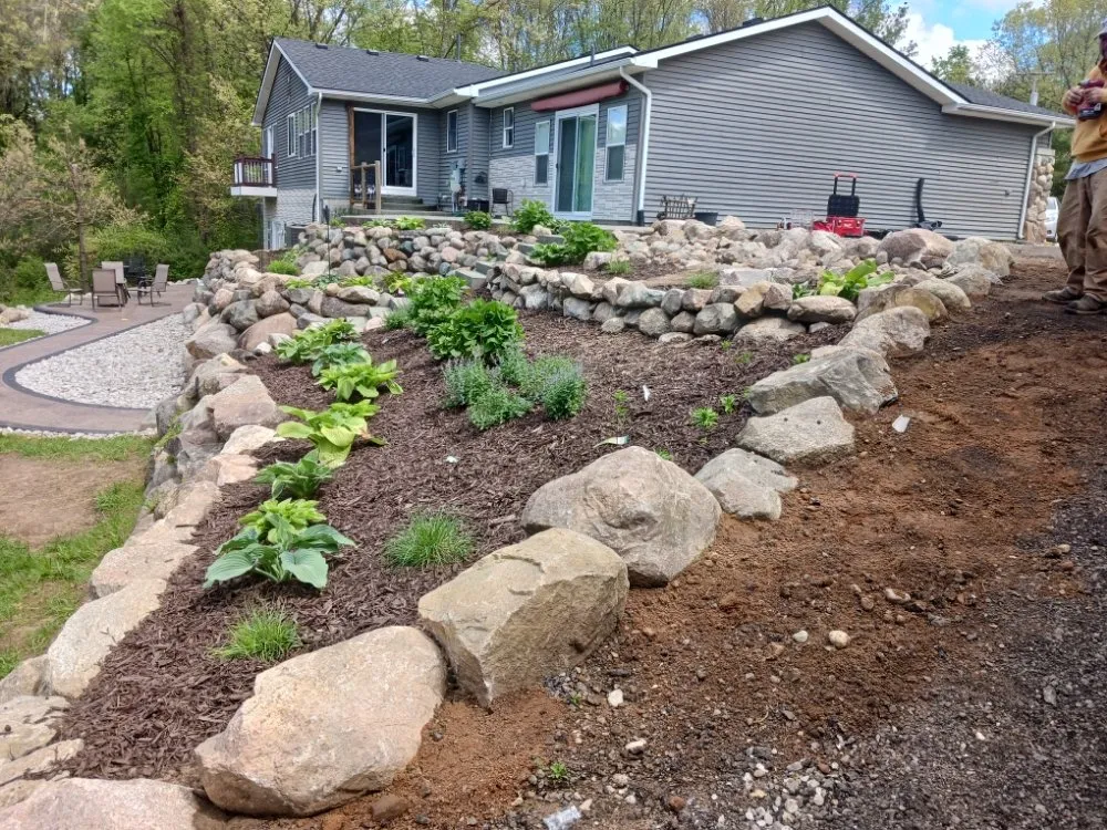 Affordable lawn care service with custom design across Novi, MI - Creative Stoneworks