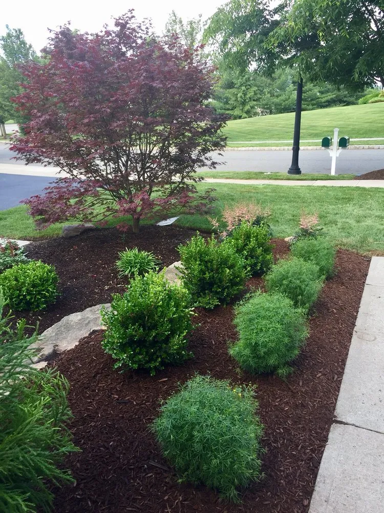 Custom garden landscaping for homes in Denville, NJ by Creative Touch Landscaping