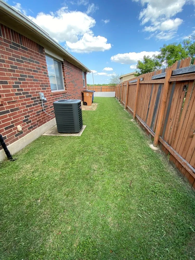 Professional outdoor landscaping in Cedar Creek, TX by Creekwood Lawn & Landscaping