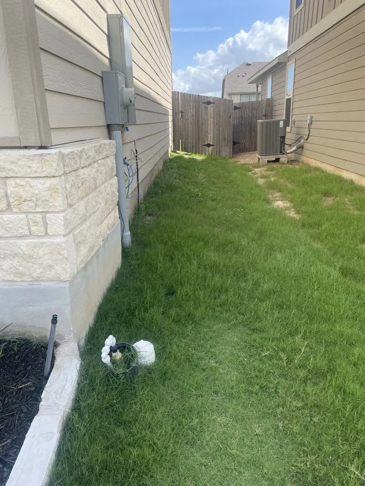 Professional lawn mowing service with custom design in Cedar Creek, TX by Creekwood Lawn & Landscaping