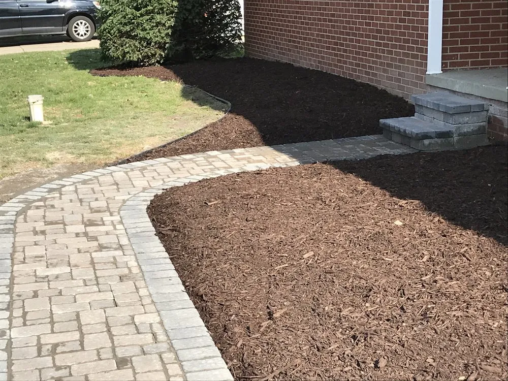 Professional yard cleanup service with custom design in Mount Morris, MI by Crews Lawn Care & Landscaping