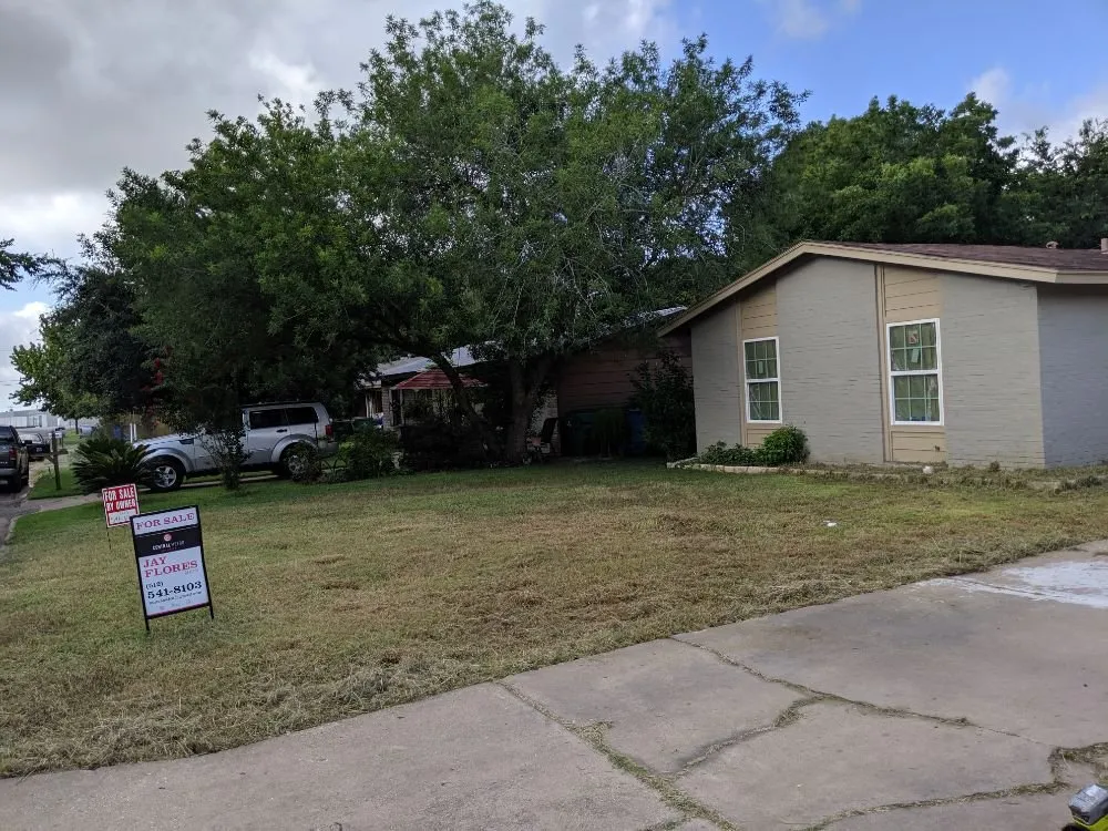 Affordable landscape design for homes in Taylor, TX by Critchfield Lawn Service