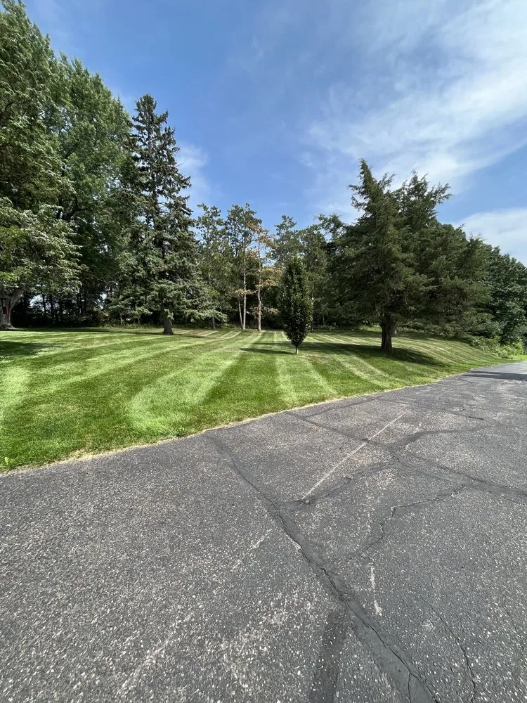Top-rated lawn mowing service experts serving River Falls, WI - CRM Services
