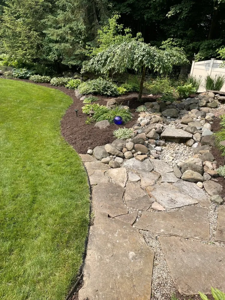 Expert garden landscaping with custom design in Dansville, MI by Croegaert's Lawn & Landscape