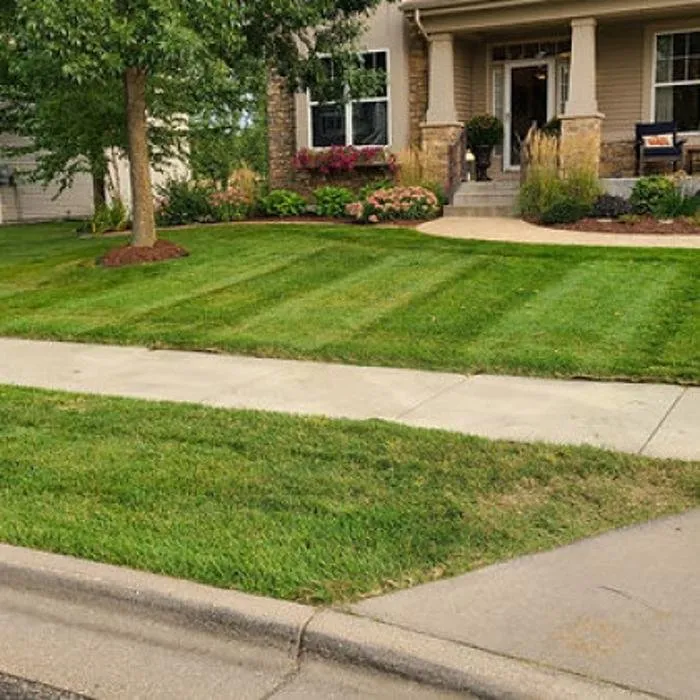 Local lawn mowing service near you in Prescott, WI by Croix Valley Curbing and Landscaping