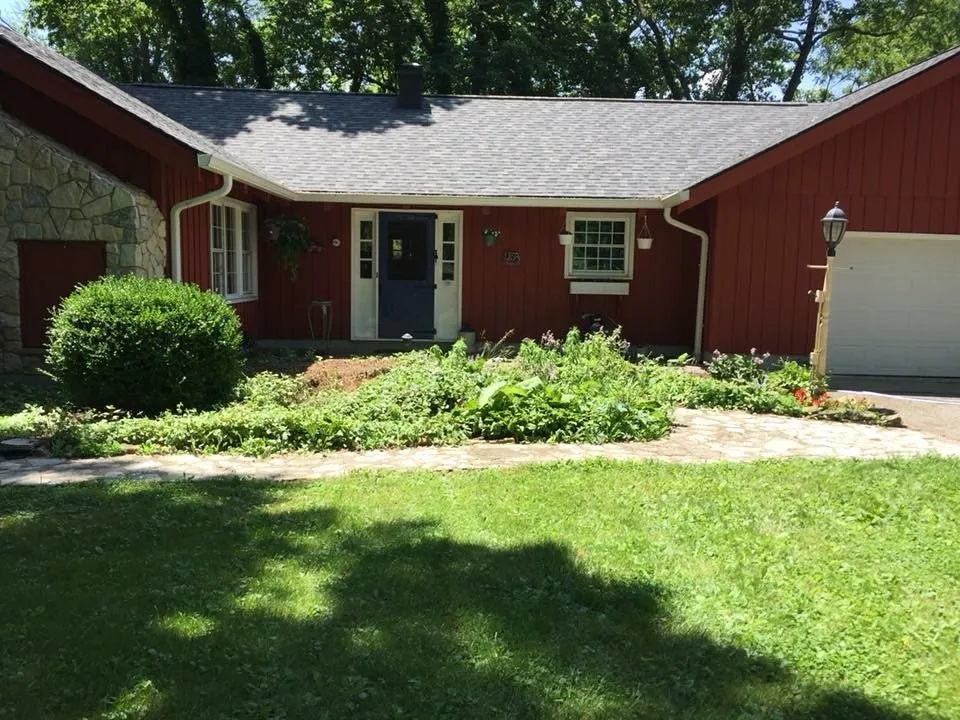 Custom landscape installation with custom design in Piqua, OH by Cross Trail Landscape & Lawn Maintenance