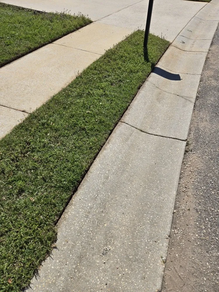 Custom lawn mowing service for residential properties in Foley, AL by Crossover Lawn Care