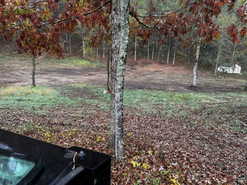 Custom landscape installation for residential properties in Sweetwater, TN by Crossroads Construction & Land Clearing