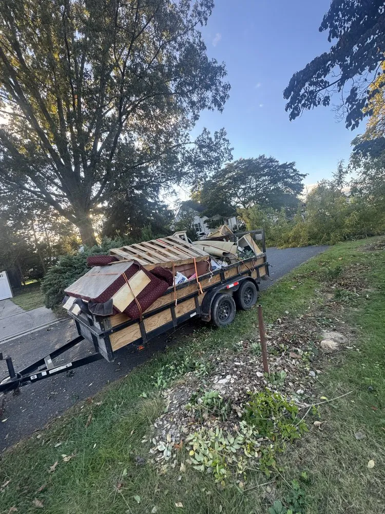 Professional lawn care service experts serving Essex, MD - Crow Truck’s Hauling