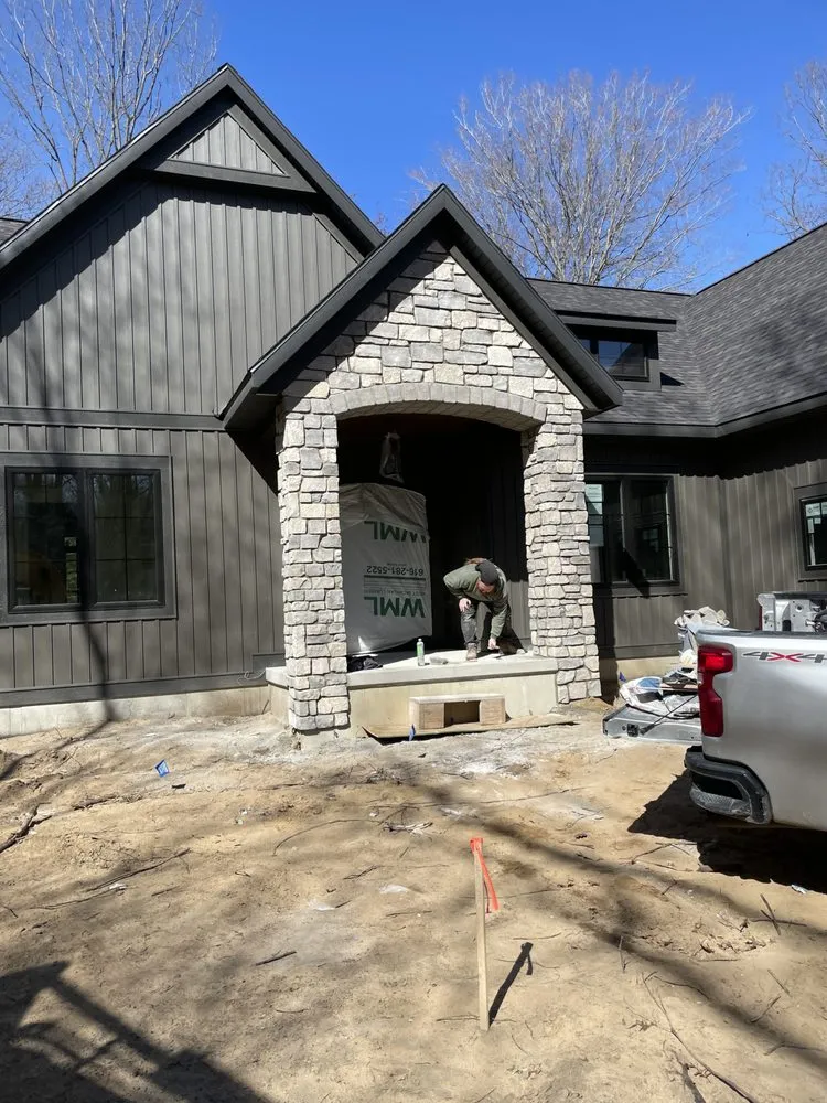 Local lawn mowing service for homes across Caledonia, MI - Crown Masonry & Design