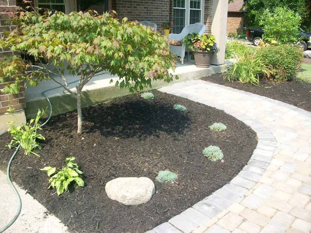 Expert landscaping services for year-round maintenance in Florence, KY by Cru Cutters