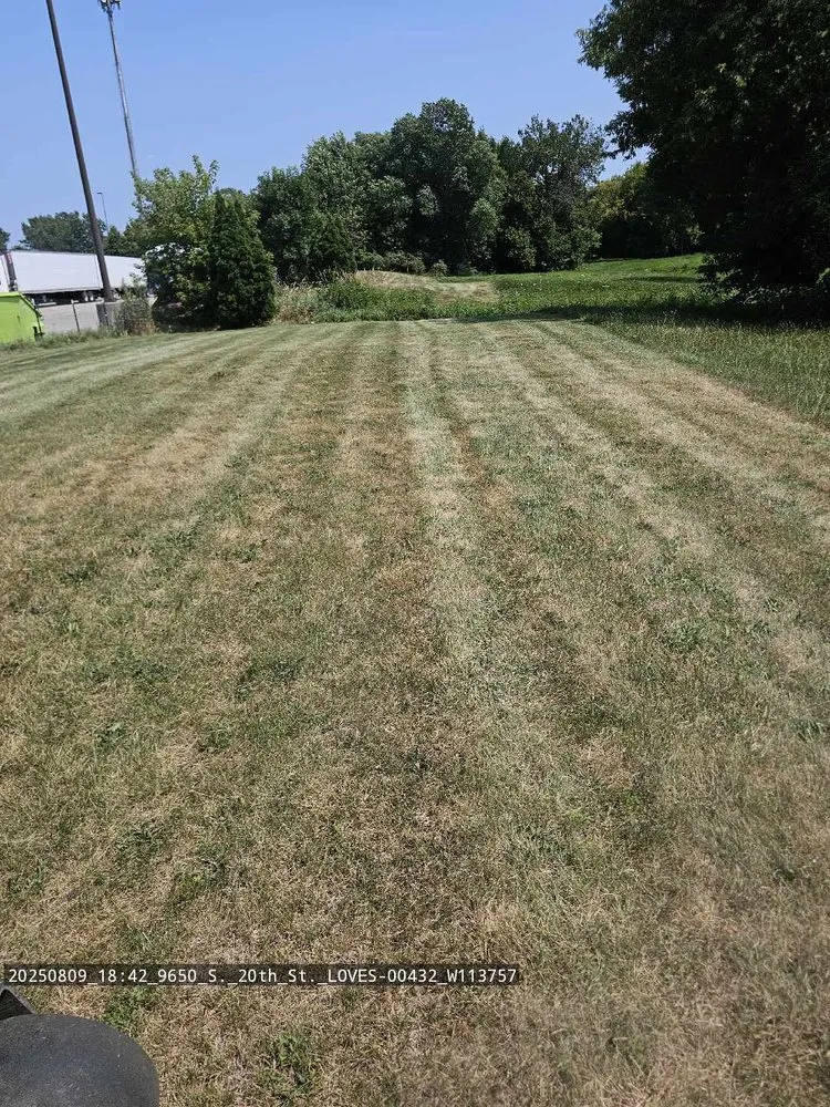 Affordable lawn mowing service for year-round maintenance in South Milwaukee, WI by Cruz and Co