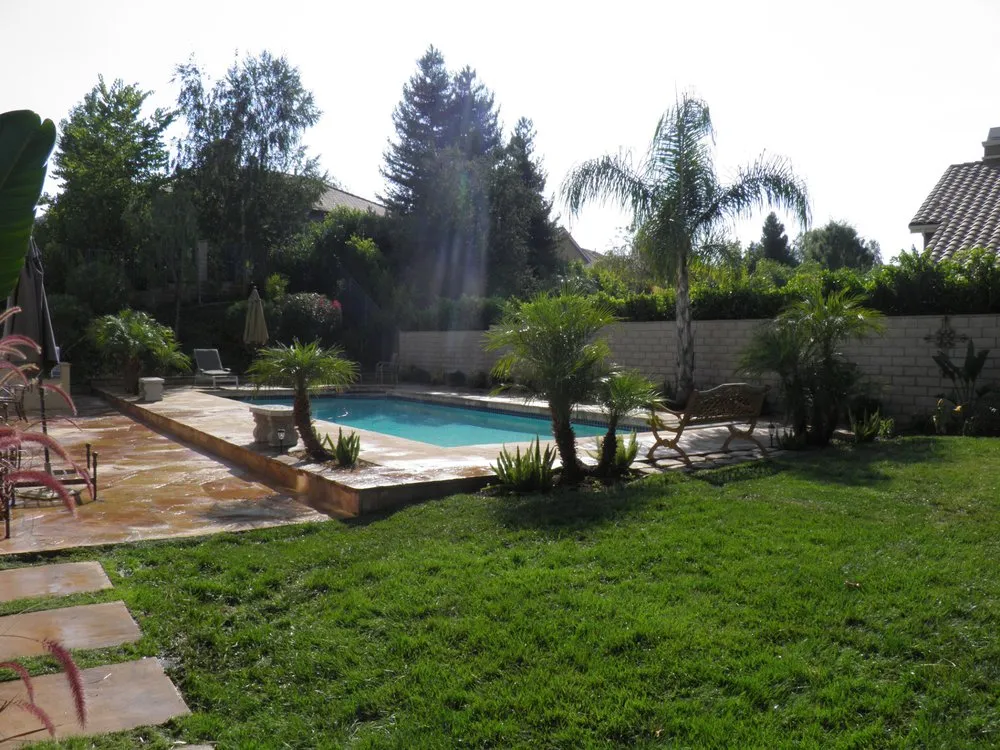 Affordable lawn mowing service with custom design in Northridge, CA by Cruz Construction & Landscape