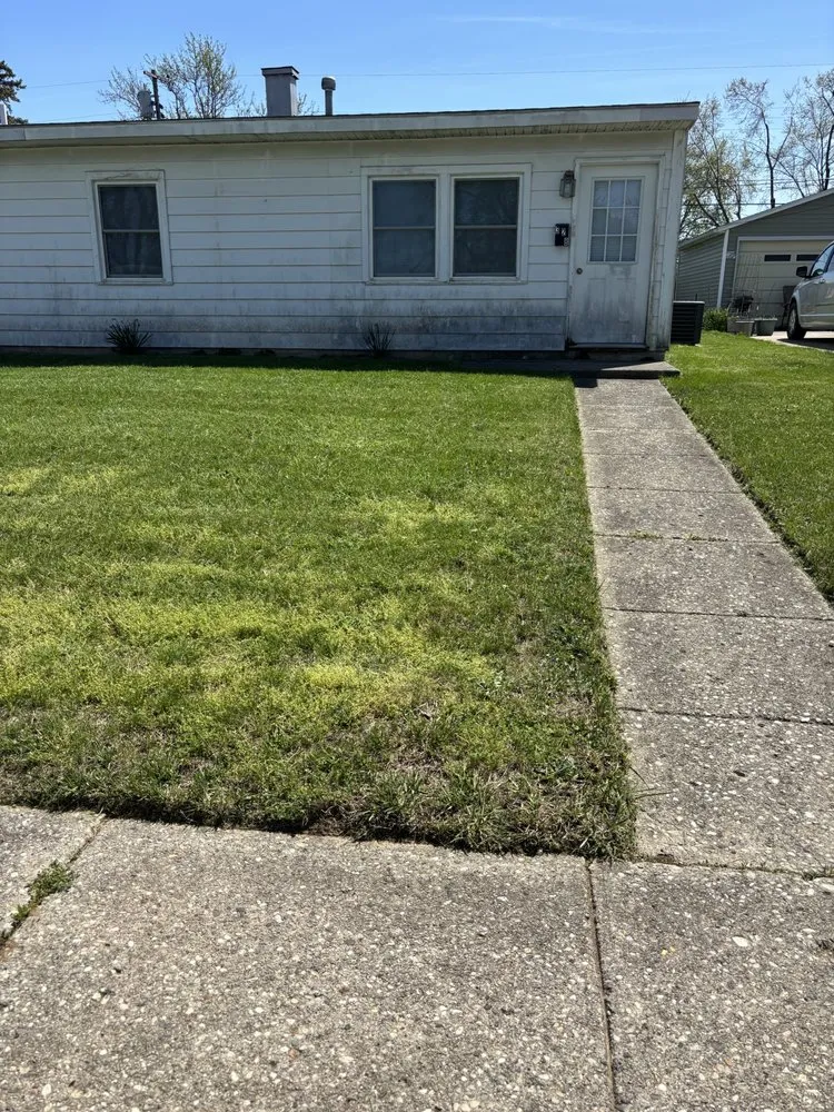 Professional yard maintenance for residential properties in New Carlisle, OH by Cruz Lawn Care Service