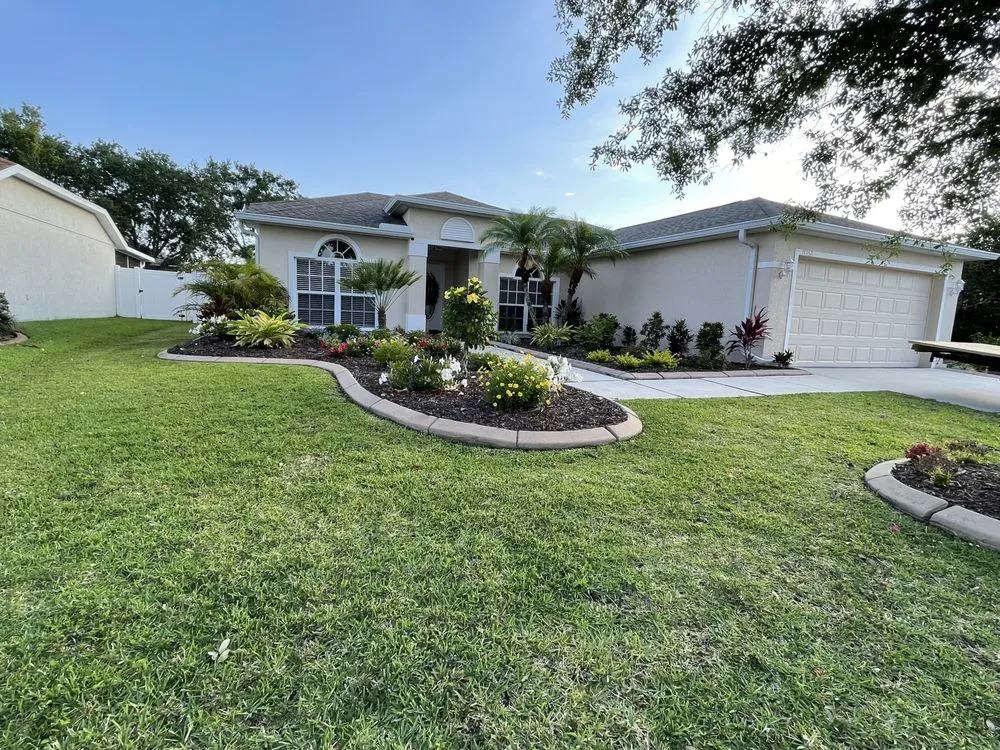 Expert landscaping services for residential properties in Bradenton, FL by Cruz Lawn Service