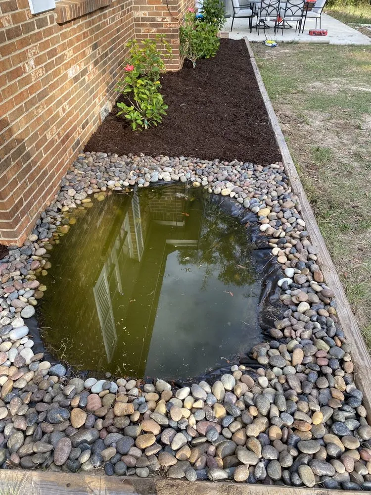 Custom landscape design for outdoor upgrades in Semmes, AL by C&S Lawn Care