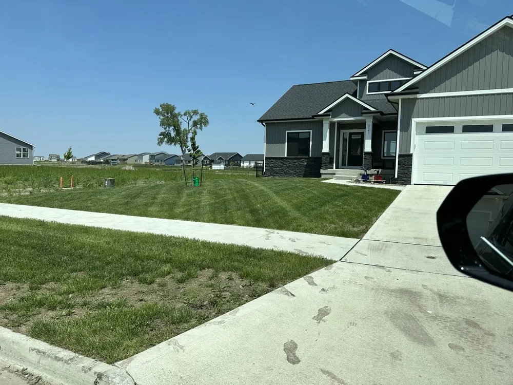 Affordable landscape installation for residential properties in Bondurant, IA by CS Snow Solutions