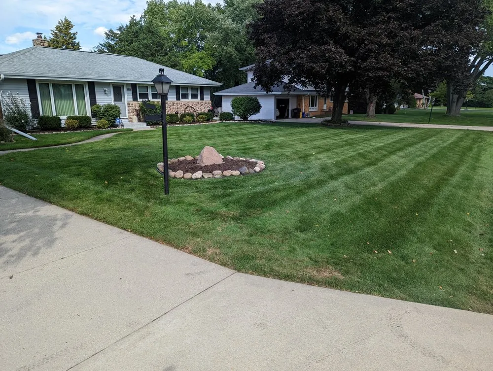 Top-rated yard cleanup service with custom design in New Berlin, WI by CT Landscaping