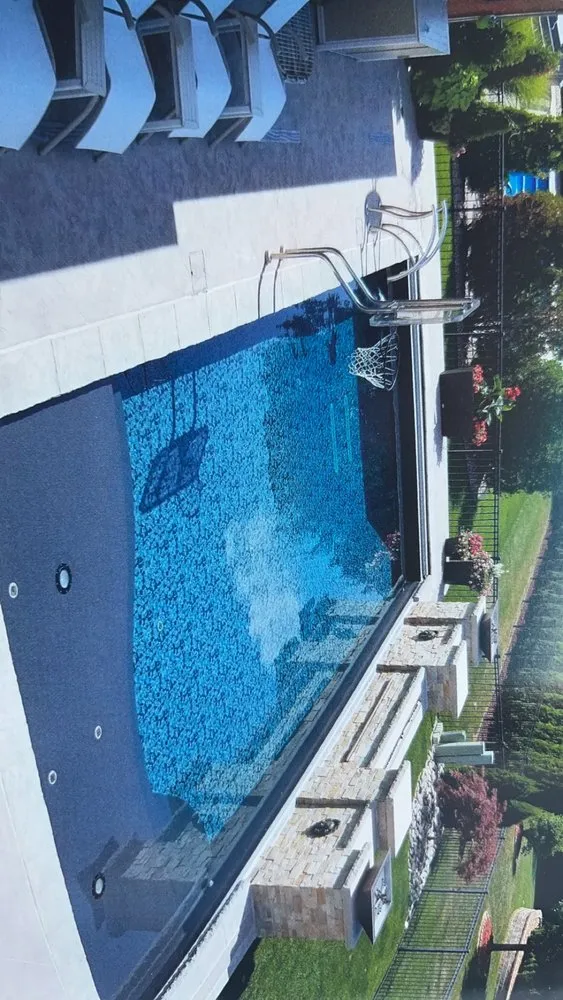 Affordable lawn mowing service for year-round maintenance in Kansas City, KS by CTB Pool & Patio