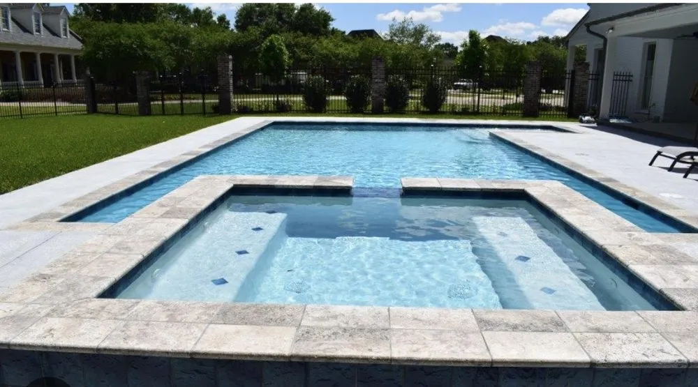 Affordable yard cleanup service for year-round maintenance in Kansas City, KS by CTB Pool & Patio