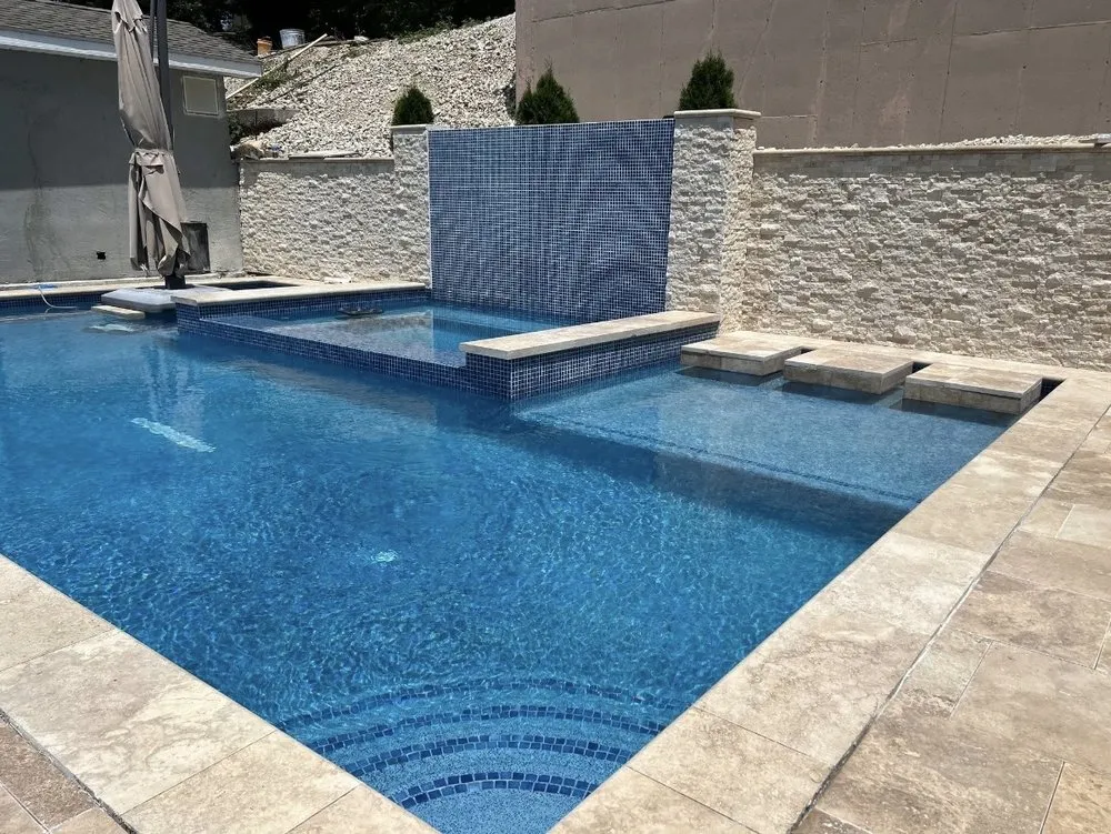 Affordable landscape installation for residential properties in Kansas City, KS by CTB Pool & Patio