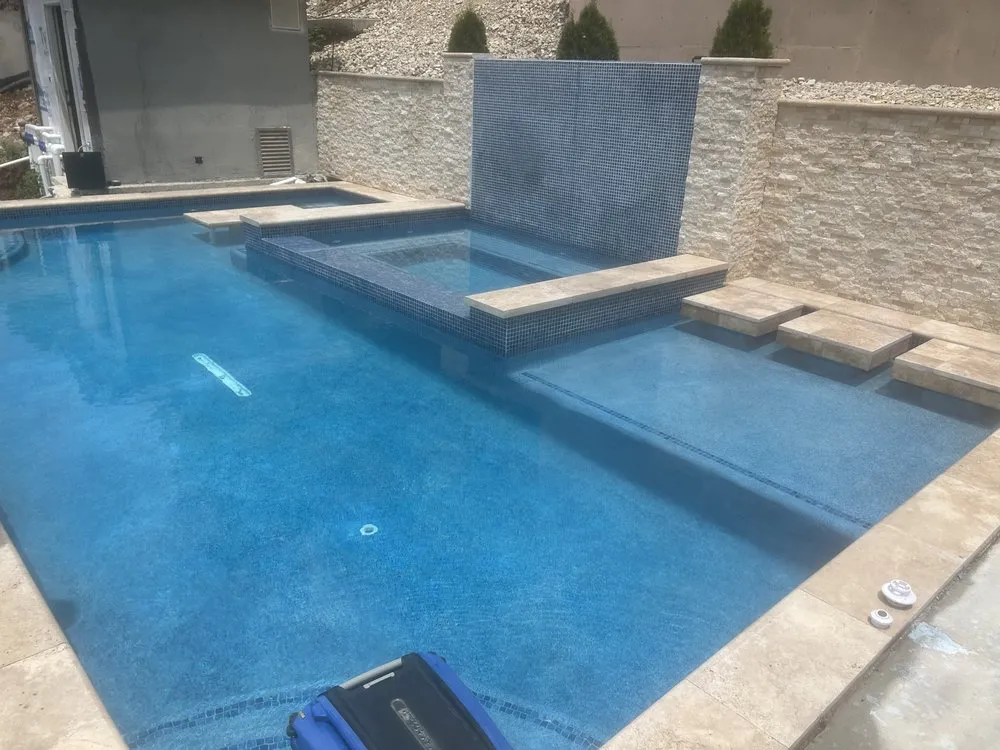 Local lawn mowing service with custom design in Kansas City, KS by CTB Pool & Patio