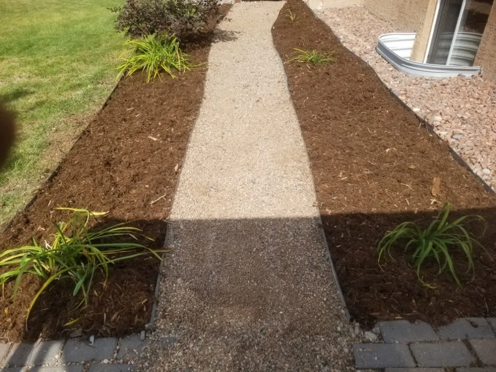 Custom garden landscaping for residential properties in Colorado Springs, CO by CTC Yard Service