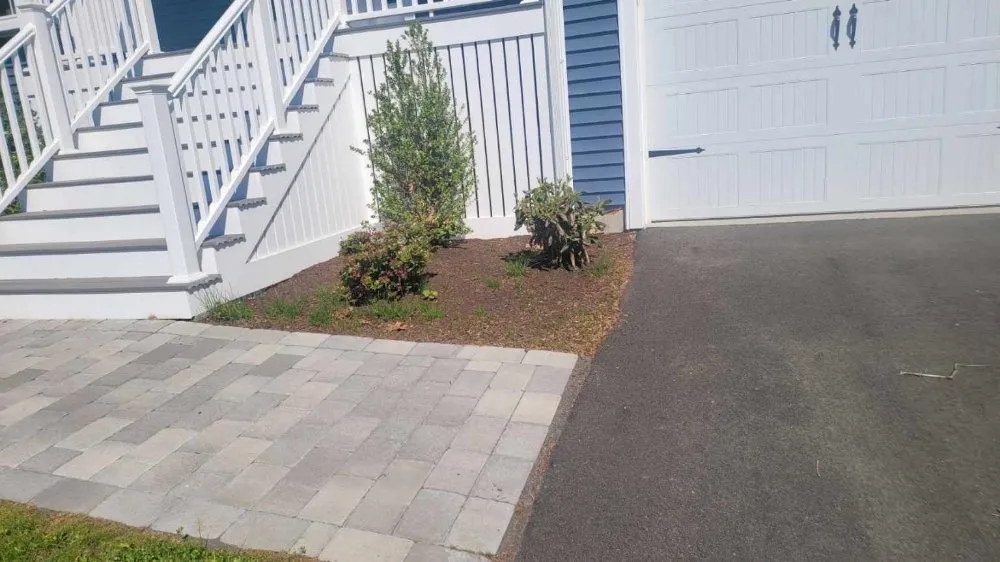 Expert lawn mowing service for year-round maintenance in Lynn, MA by Cubias Landscaping & Masonry