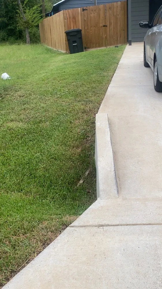 Expert lawn mowing service for residential properties in Montgomery, TX by Cuellos Lawn Enforcement