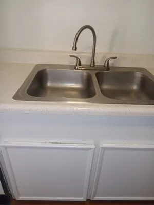 Cuna’s Handyman and Landscaping Logo