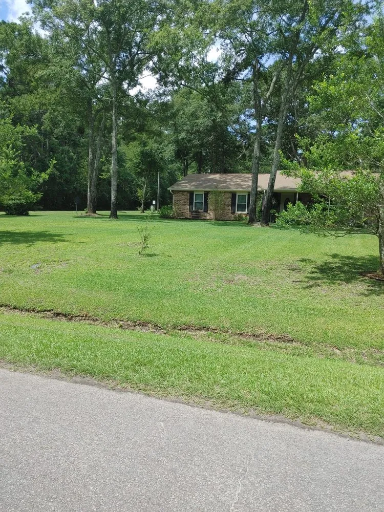 Professional lawn mowing service with custom design in Okatie, SC by Curb Appeal Landscape Maintenance