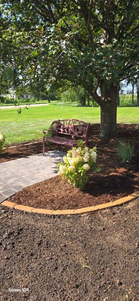 Affordable landscape design for year-round maintenance in Osage, IA by Curb Appeal Landscaping