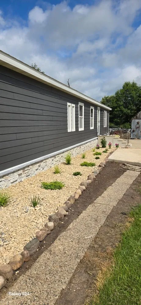 Professional yard cleanup service near you in Osage, IA by Curb Appeal Landscaping