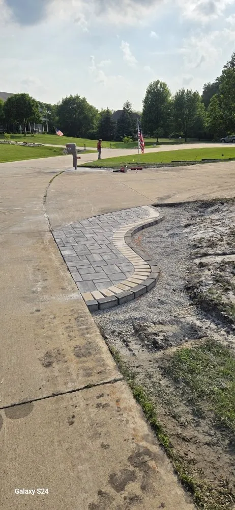 Professional landscape installation in Osage, IA by Curb Appeal Landscaping