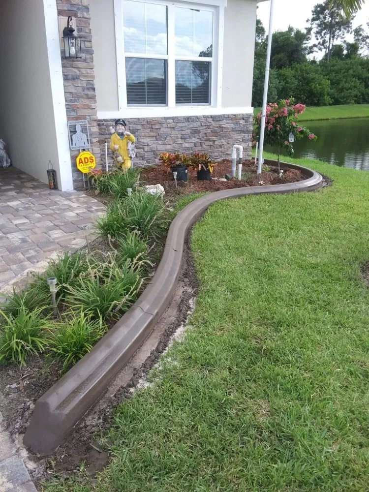 Professional yard cleanup service for residential properties in Palm Bay, FL by Curb Appeal Of Brevard