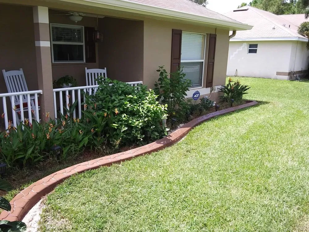 Custom outdoor landscaping in Palm Bay, FL by Curb Appeal Of Brevard