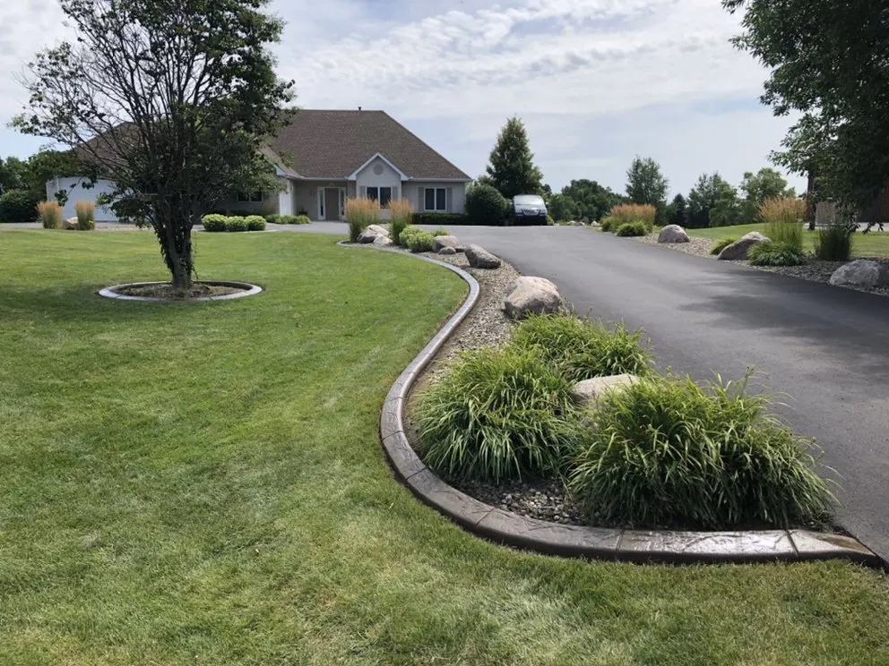 Expert yard maintenance with custom design in Shakopee, MN by Curb-It Design