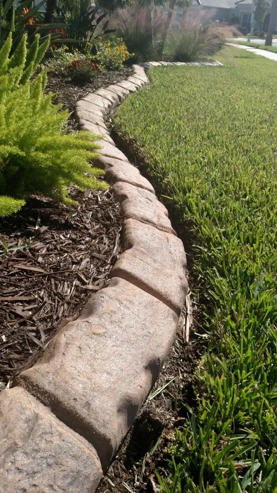 Custom yard maintenance with custom design in Sarasota, FL by Curb It