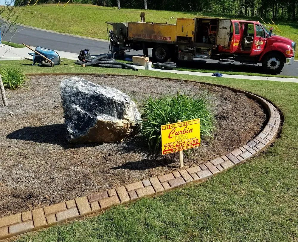 Reliable yard cleanup service in Cartersville, GA by Curbin USA Landscp Curbing