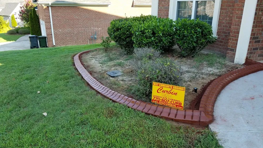 Professional yard cleanup service in Cartersville, GA by Curbin USA Landscp Curbing