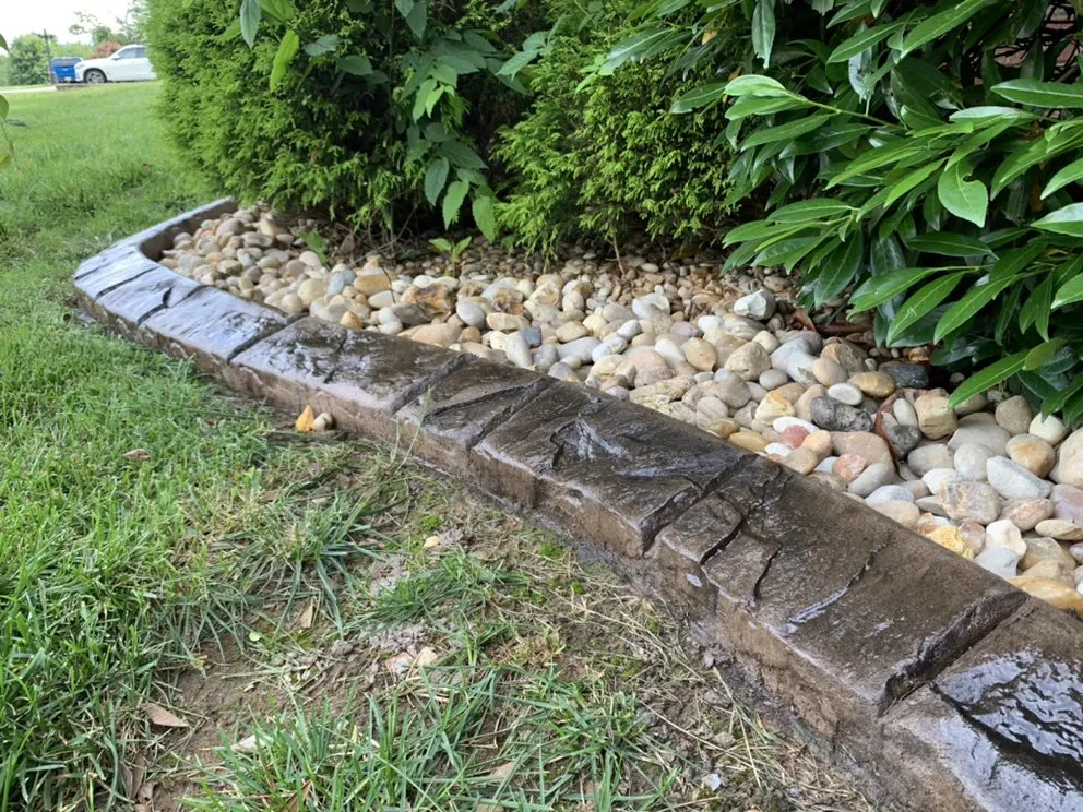 Custom residential landscaping with custom design in Palmyra, TN by Curbpro Custom Concrete