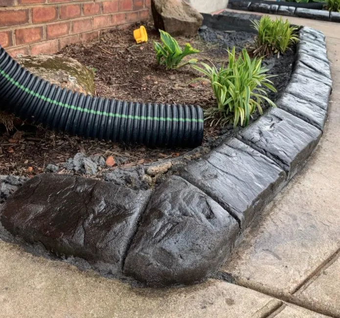 Custom outdoor landscaping for residential properties in Palmyra, TN by Curbpro Custom Concrete
