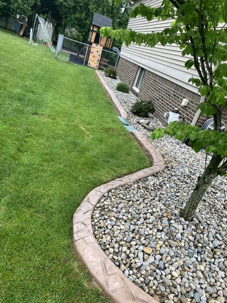 Custom outdoor landscaping for year-round maintenance across Romulus, MI - Curbspecialists