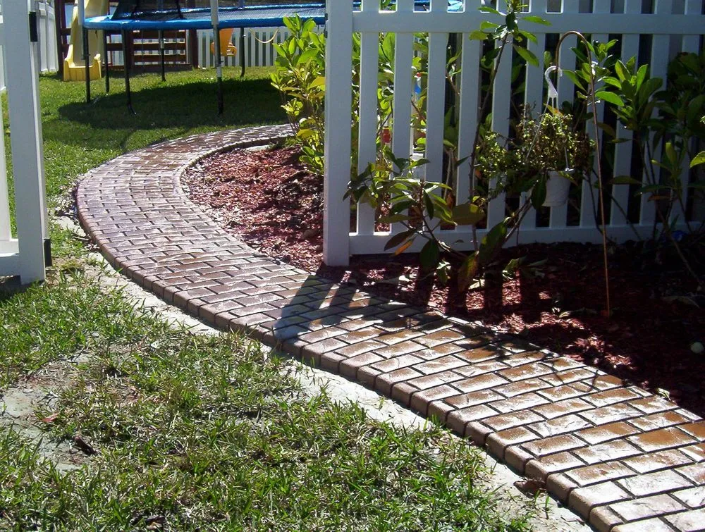 Custom landscape installation for homes in Syracuse, UT by Curbworks Decorative Curbing