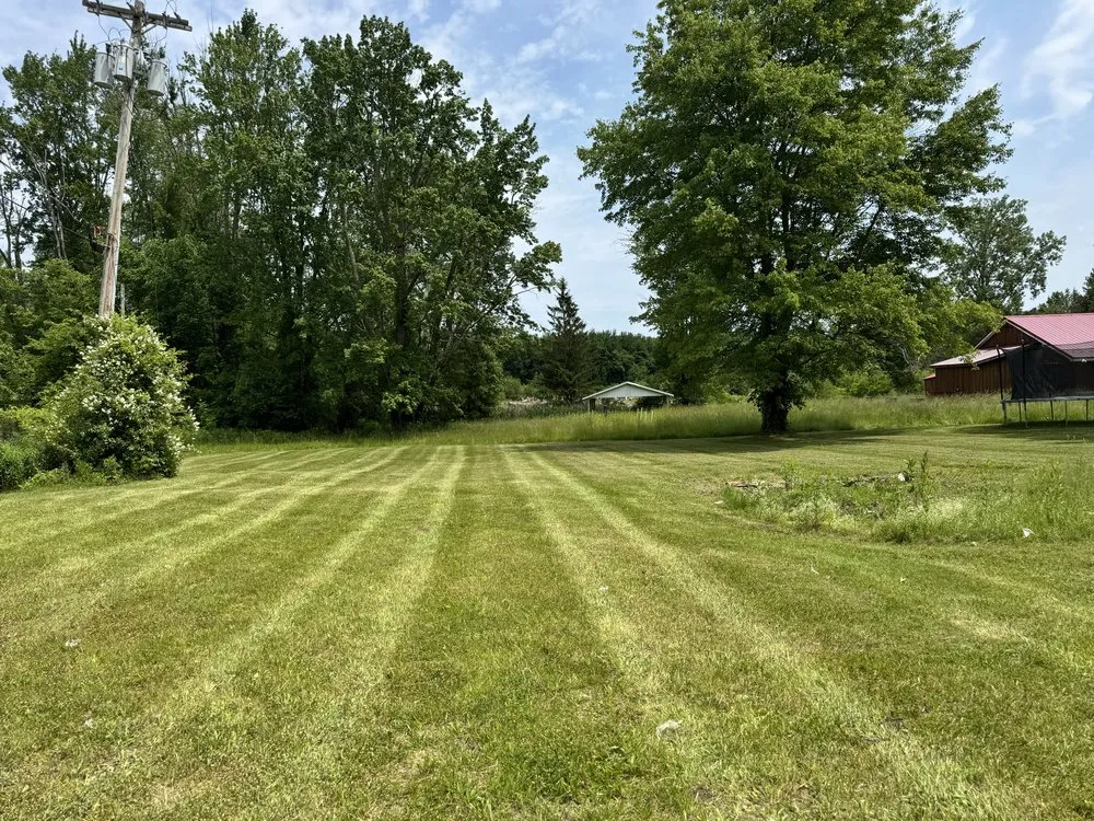 Reliable yard maintenance for residential properties in Fulton, NY by Curtis Landscaping