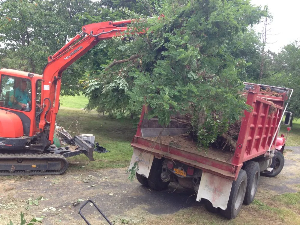 Affordable lawn mowing service for homes in Hudson, NY by Curt's Lawn & Excavating Service